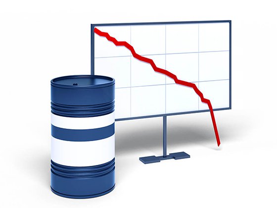 Oil barrel next to graphic showing falling prices off the chart