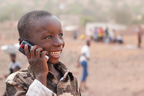 African child with a mobile phone